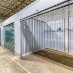 indoor climate-controlled storage units with green doors