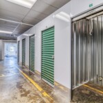 indoor climate-controlled storage units with green doors