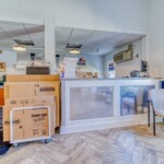 office with on-site management and seating area