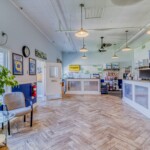 office with on-site management, moving supplies for sale, and seating area